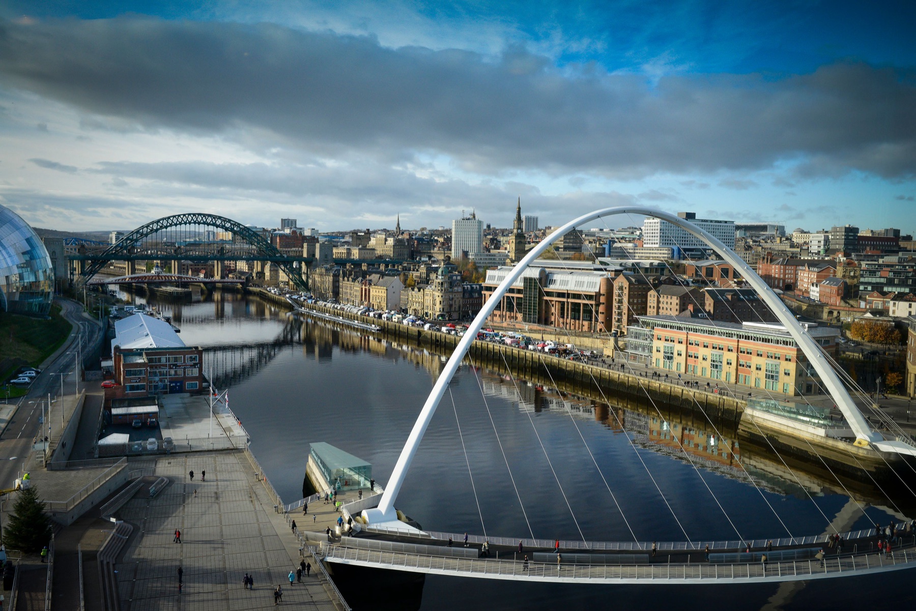 The River Tyne at Newcastle upon Tyne, with the Tyne Bridge and the Gateshead Millennium Bridge over the quayside